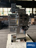 Image of Wrapade Strip Packer, Model UPH310 04