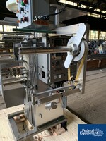 Image of Wrapade Strip Packer, Model UPH310 10