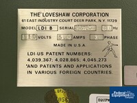 Image of Loveshaw Case Taper, Model LDI B, with flexible roller conveyor 02