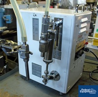Image of One used FilaMatic DAB-6 Twin Piston Filler w/ Foot Pedal 04