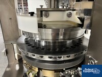 Image of Kikusui Tablet in Tablet Press, Model Aquarius G-J/DC 15