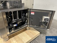 Image of Kikusui Tablet in Tablet Press, Model Aquarius G-J/DC 26