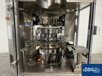 Image of Kikusui Tablet in Tablet Press, Model Aquarius G-J/DC 08