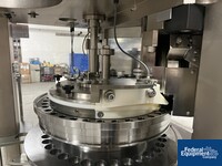 Image of Kikusui Tablet in Tablet Press, Model Aquarius G-J/DC 14