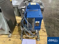 Image of Quadrel Wrap Around Labeler, Model Rotary 35