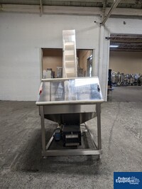 Image of Cap  Bottle Elevator, S/S 04