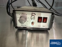 Image of Round Bottle Llabeler 03