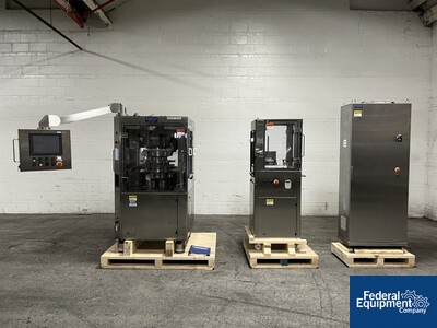 Image of Kikusui Tablet in Tablet Press, Model Aquarius G-J/DC